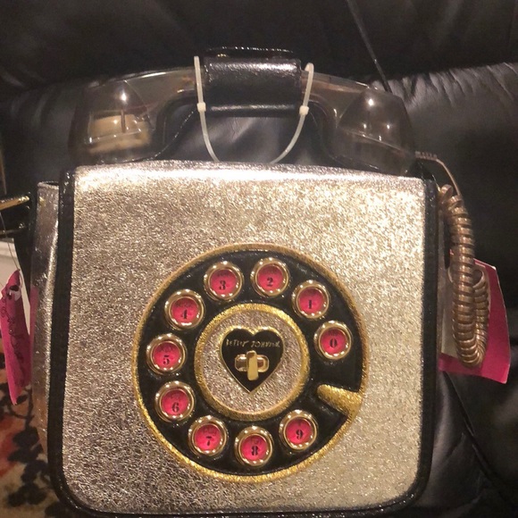 Betsey Johnson Handbags - Betsy Johnson silver phone bag.
